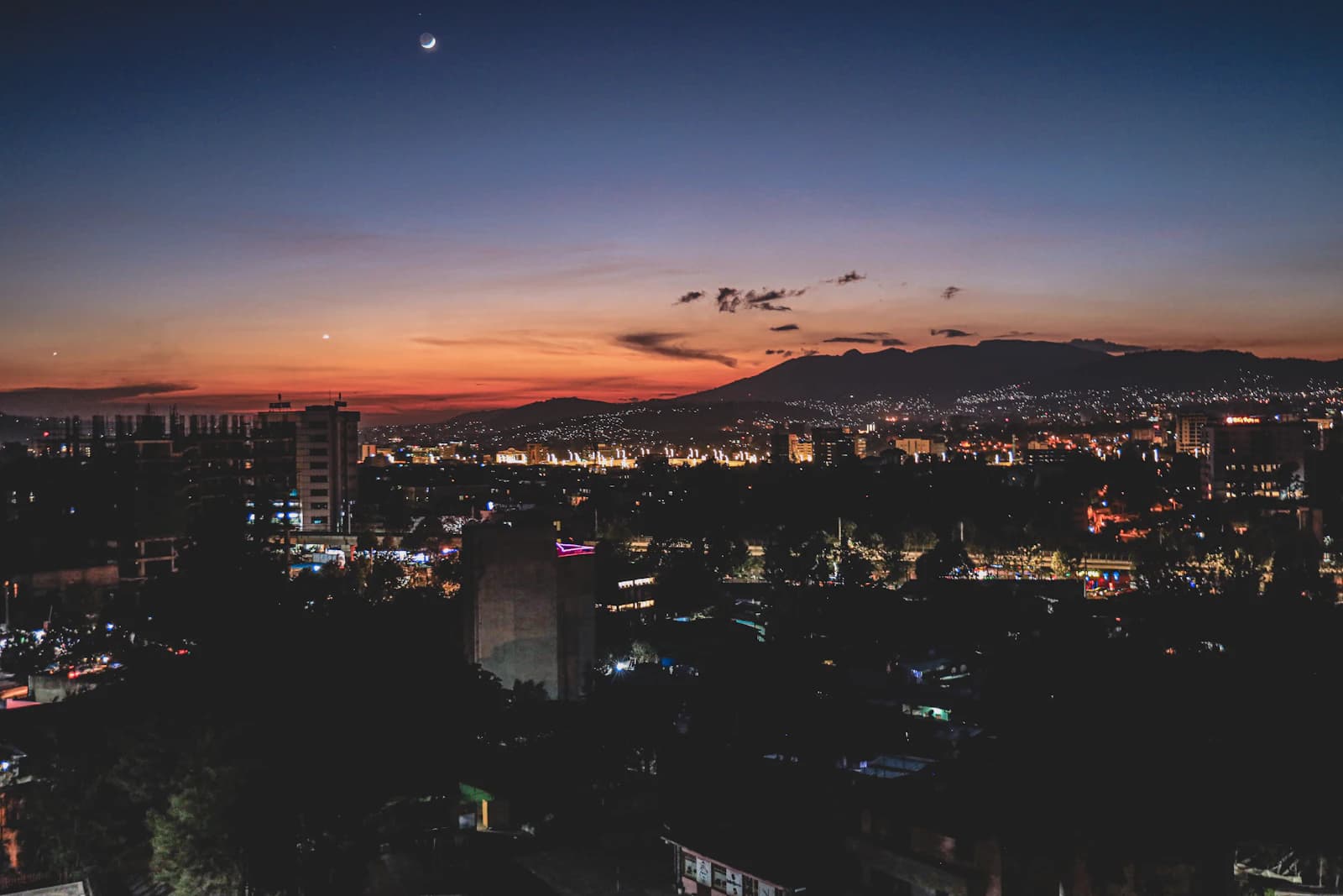 Addis Ababa at dusk beneath the Entoto hills